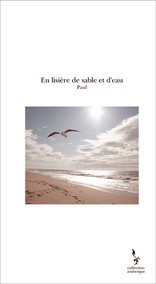 En lisière de sable et d'eau