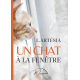 Un chat à la fenêtre